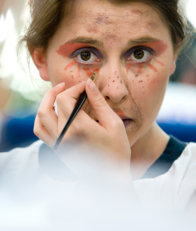 Student puttin gon stage makeup